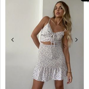 Purple floral dress with cutout details